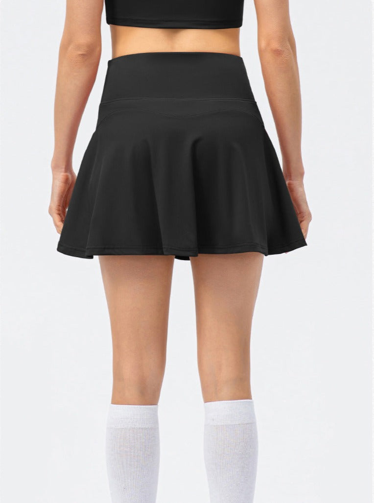 Sienna | Sportig tenniskjol med integrerade shorts